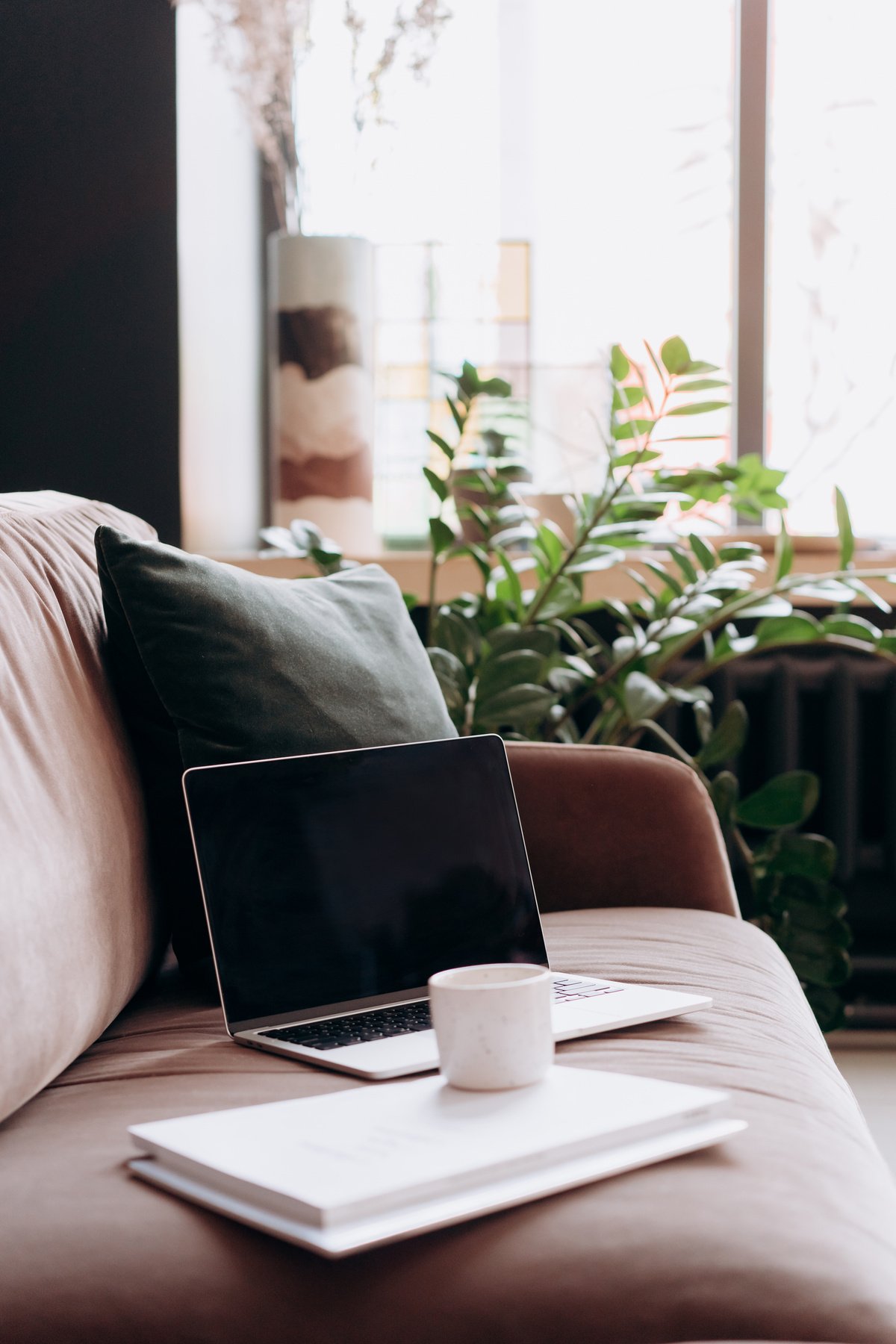 Macbook Laptop on Pink Velvet Couch